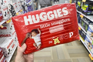 hand holding huggies preemie diapers at meijer