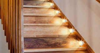 led puck lights on a staircase