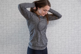 a woman wearing a bestselling Lululemon dupe: The CRZ Yoga athletic top from Amazon