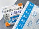 active washing machine cleaner next to an amazon prime envelope