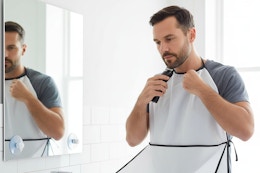 a man using a beard apron