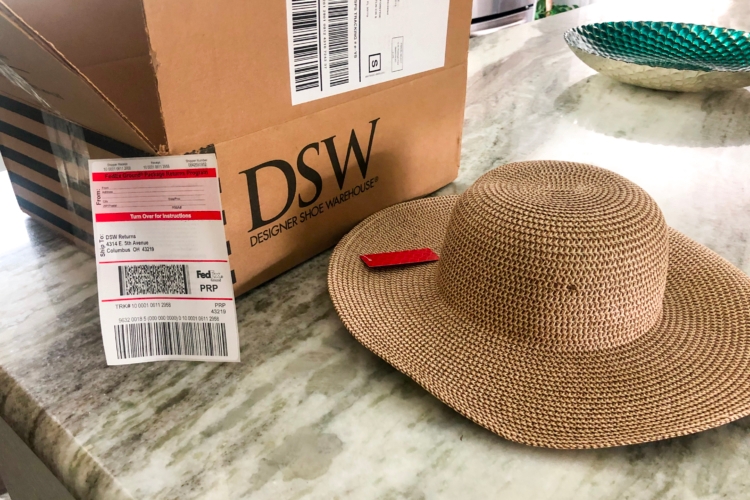 DSW shipping box, return label and hat.