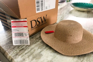 DSW shipping box, return label and hat.
