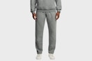 a man wearing fruit of the loom sweatpants