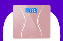 Stock image of a pink digital bathroom scale