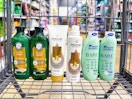 pantene, herbal essences, and head & shoulder products in a shopping cart