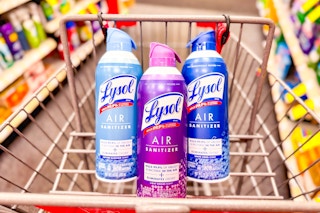 3 bottles of lysol air sanitizer in a cart