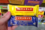 hand holding larabar single bar