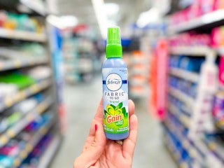 Febreze Spray (travel size) held up in center isle at Walmart