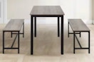 Lifestyle image of the Homestock 3-piece dining set: 1 table and 2 benches