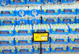 A pack of Signature select water in a store
