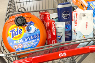 tide pods, colgate toothpaste, degree deodorant, nivea men body wash, and huggies baby wipes in a cart