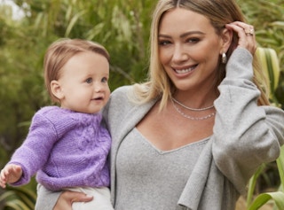 hilary duff holding a baby