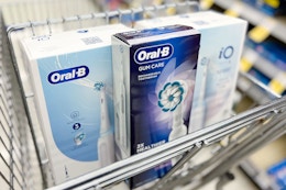 oral-b electric toothbrushes in a walgreens cart