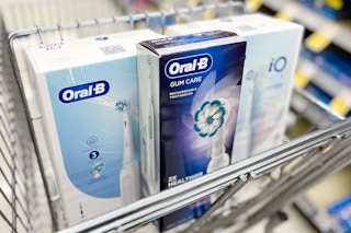oral-b electric toothbrushes in a walgreens cart