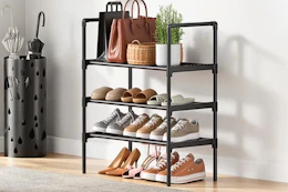 Lifestyle image of a 3-tier shoe rack in home setting 
