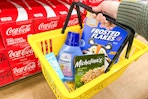 dollar general groceries in a yellow basket