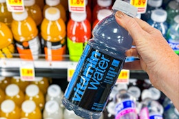 hand holding a bottle of vitaminwater