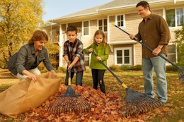 a family with metal rakes