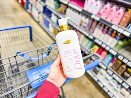 Dove body wash held over Walmart shopping cart in store