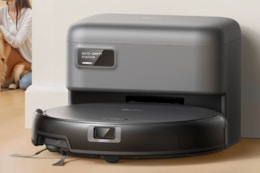 Self-Emptying Smart Robot Vacuum sitting in its dock.