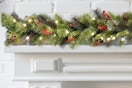National Tree Company Pre-Lit Artificial Christmas Garland draped on a mantle.