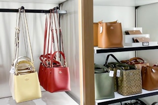 Coach bags on display at a Coach Outlet store.