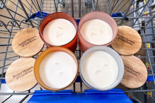 Four Better Homes & Gardens Candles in Walmart shopping cart