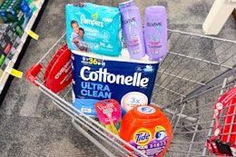 pampers wipes, loreal elvive shampoo, cottonelle toilet paper, tide pods, and venus razors in a cart