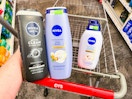 hand holding two nivea body washes next to cvs cart