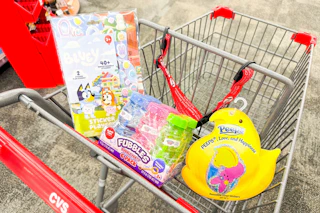 easter basket stuffers in a cart: bluey, fubbles, and peeps