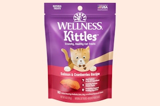 Wellness Kittles Cat Treats Bag on Beige background