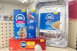 total home food storage bags, trash bags, and baking pans on a shelf
