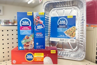 total home food storage bags, trash bags, and baking pans on a shelf