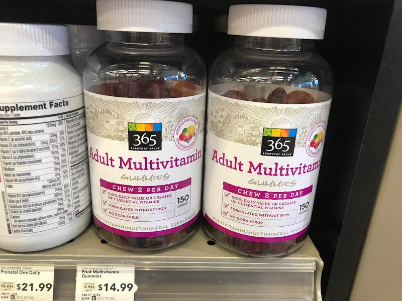 Whole Foods 365 gummy multivitamins on a shelf.