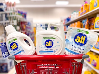 3 all laundry sitting on top of a target cart