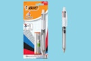 a pencil/pen next to its packaging 