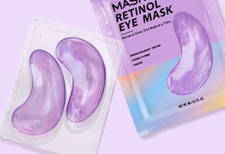 a person with purple eye patches on their face