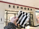 Sephora samples in front of a Sephora store.