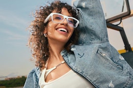 a woman wearing blue light glasses