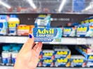hand holding advil box