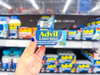 hand holding advil box