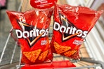 2 bags of doritos chips in a cart
