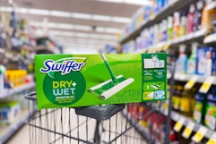 swiffer sweeping kit on a cart in an aisle