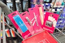nail clippers, tweezers, and other beauty products in a cart