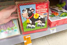 hand touching melissa and doug puzzle on clearance