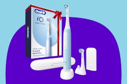 Oral-B iO Deep Clean Rechargeable Electric Powered Toothbrush on a purple background.