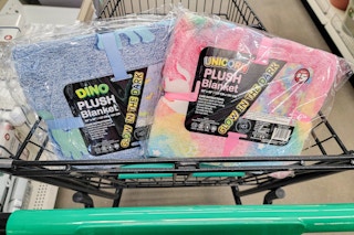 2 glow in the dark blankets in a cart