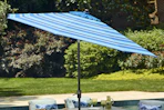 blue and white striped patio umbrella