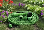 an expandable hose in a garden
